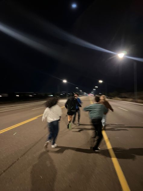 Running in the highway with my friends at night